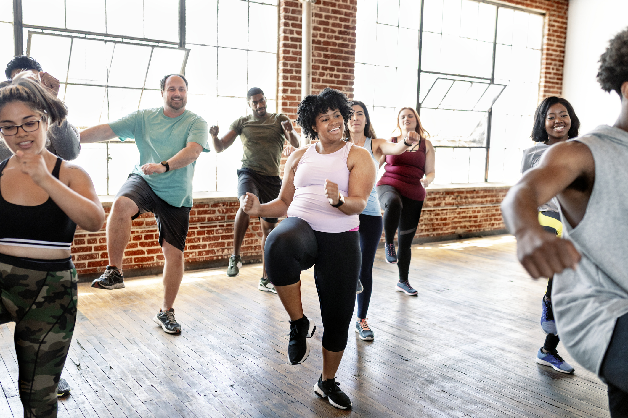 Diverse people in an active dance - Yellow Cedar Diverse people in an active dance class
