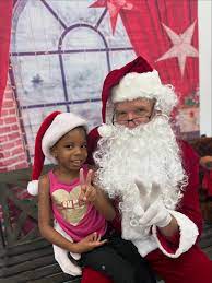 Child Happy with Santa for Kidsville